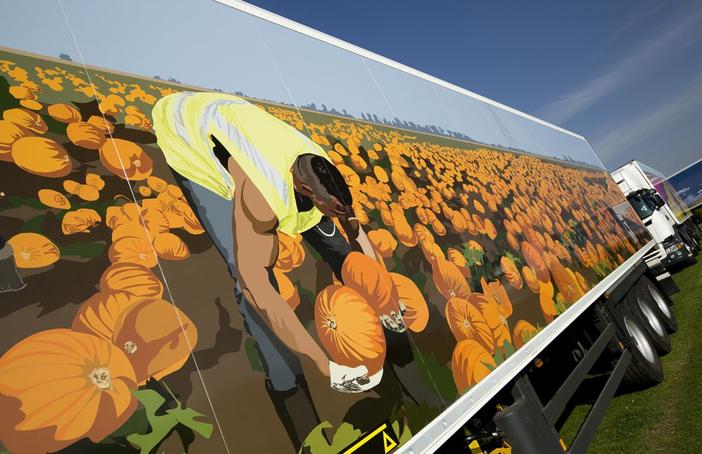 Photo: Electric Egg Artist Alisha Miller designs wraps for ten FreshLinc lorries