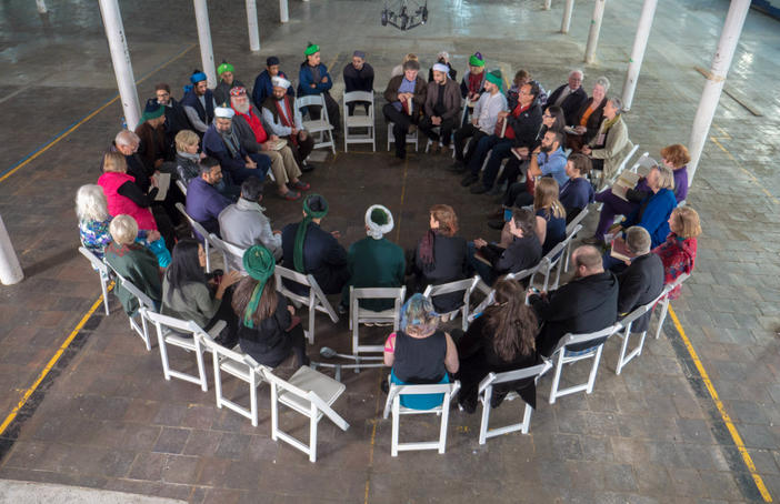 Sufi chanters, Shape Note singers and local residents come together to share in music and song in the disused Brierfield Mill in Pendle. Part of a three-day art film event Shapes of Water, Sounds of Hope, a collaboration between pioneer in public art Suzanne Lacy and arts collective In-Situ. Super Slow Way. Photo Graham Kay